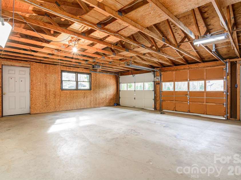 261 Cedar Lane, Arden, NC 28704.  MLS# CAR4366543, YatesRealty ID 12781. 2 car attached garage