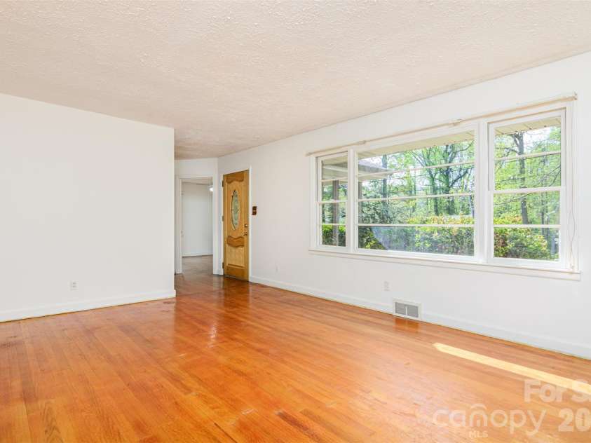 261 Cedar Lane, Arden, NC 28704.  MLS# CAR4366543, YatesRealty ID 12781. Large Living Room