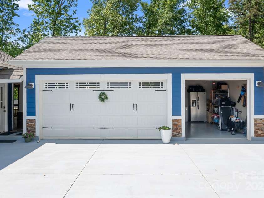 720 Cricket Lane, Mt Ulla, NC 28125.  MLS# CAR4254879, YatesRealty ID 12785. Flex Space & garage
