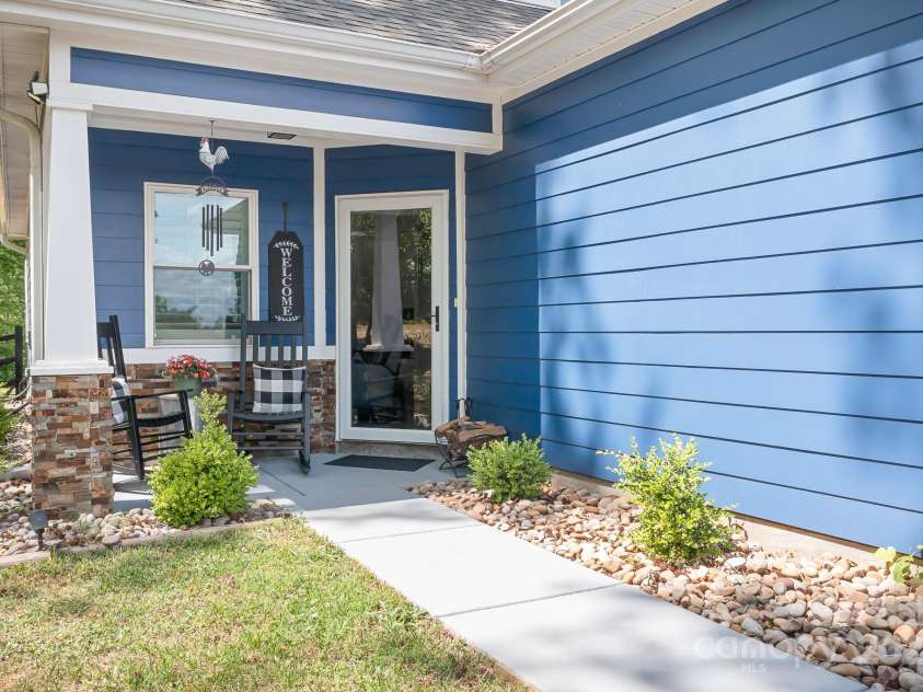 720 Cricket Lane, Mt Ulla, NC 28125.  MLS# CAR4254879, YatesRealty ID 12785. Front door with porch