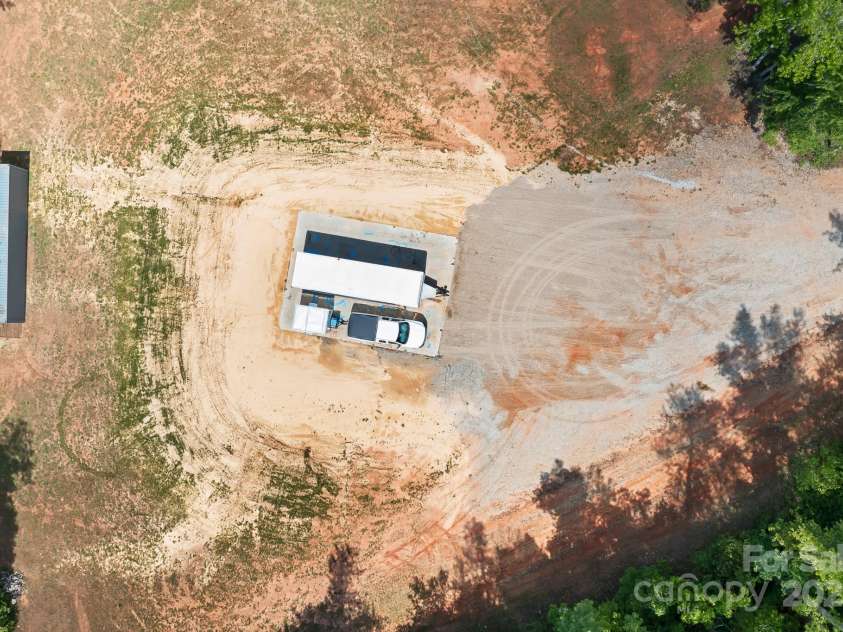 720 Cricket Lane, Mt Ulla, NC 28125.  MLS# CAR4254879, YatesRealty ID 12785. Giant concrete pad, ready to build