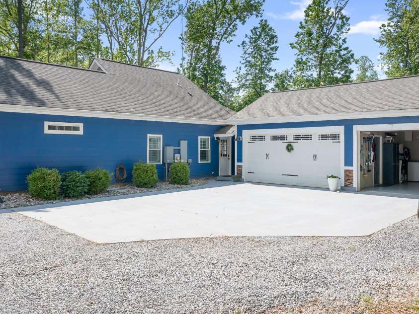 720 Cricket Lane, Mt Ulla, NC 28125.  MLS# CAR4254879, YatesRealty ID 12785. Side view