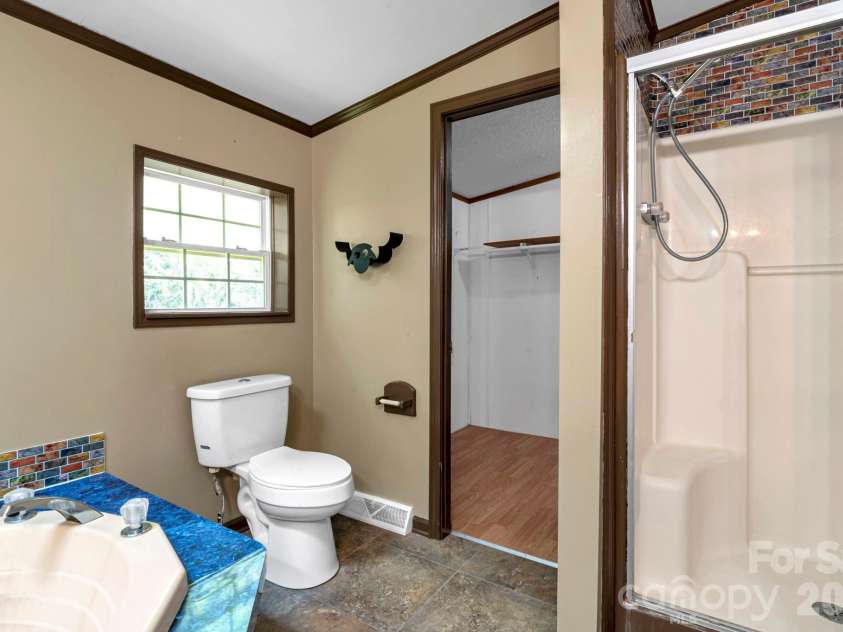 36 Tyler Cove, Alexander, NC 28701.  MLS# CAR4343099, YatesRealty ID 12786. Primary Bathroom