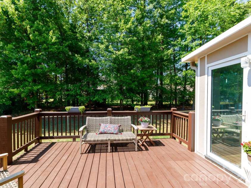 228 Timberlane Drive, Belmont, NC 28012.  MLS# CAR4369910, YatesRealty ID 12788. Deck off sunroom