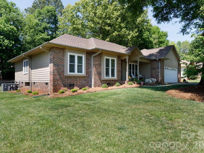 228 Timberlane Drive, Belmont, NC 28012.  MLS# CAR4369910, YatesRealty ID 12788. Large level lot