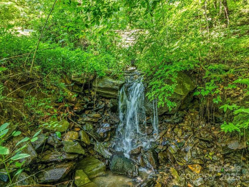 150 Sondley Parkway, Asheville, NC 28805.  MLS# CAR4280880, YatesRealty ID 1279. Natural Waterfall
