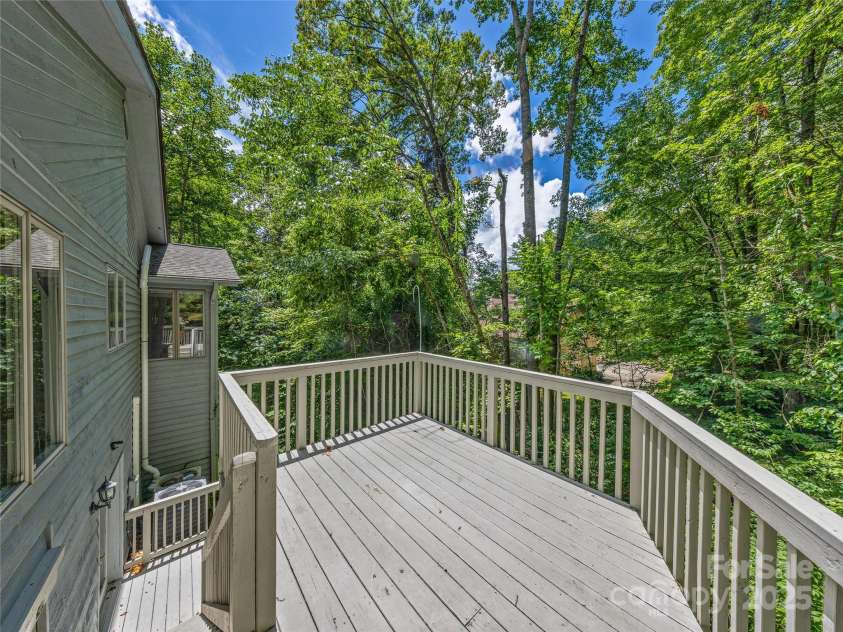 150 Sondley Parkway, Asheville, NC 28805.  MLS# CAR4280880, YatesRealty ID 1279. Stairs leading down to another deck- perfect for a hot tub!