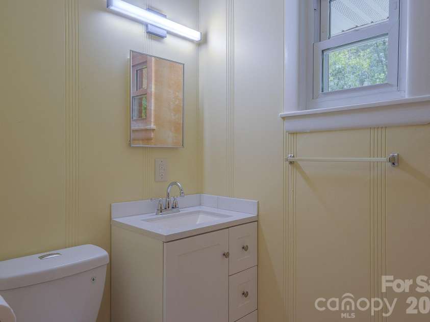 105 Alexander Avenue, Swannanoa, NC 28778.  MLS# CAR4289989, YatesRealty ID 12790. Half bath