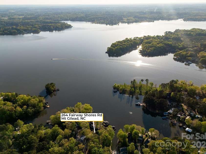 264 Fairway Shores Road, Mount Gilead, NC 27306.  MLS# CAR4244988, YatesRealty ID 12794. 