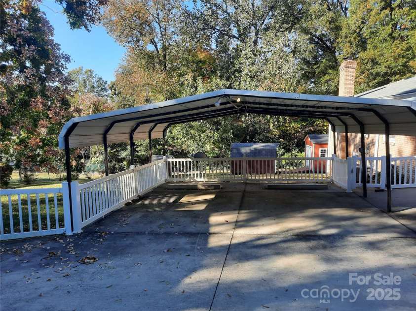 121 Greenview Drive, Kannapolis, NC 28081.  MLS# CAR4320914, YatesRealty ID 12802. Two car carport