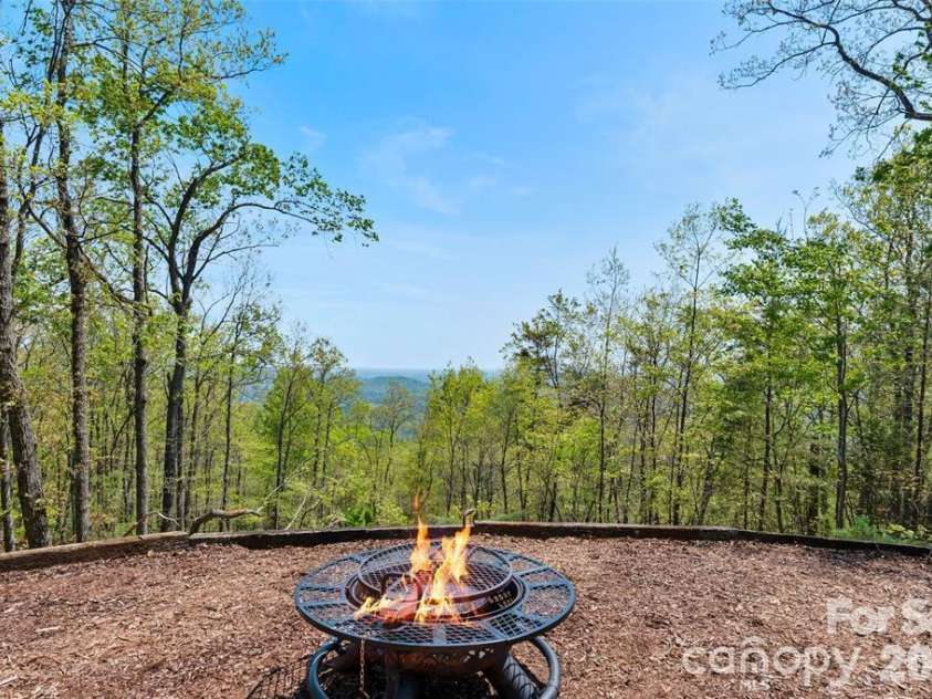 153 Chetan Way, Lake Lure, NC 28746.  MLS# CAR4371319, YatesRealty ID 12804. 