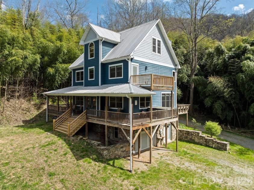 22 Pear Tree Lane, Leicester, NC 28748.  MLS# CAR4371027, YatesRealty ID 12806. Bamboo is evergreen providing year round privacy.