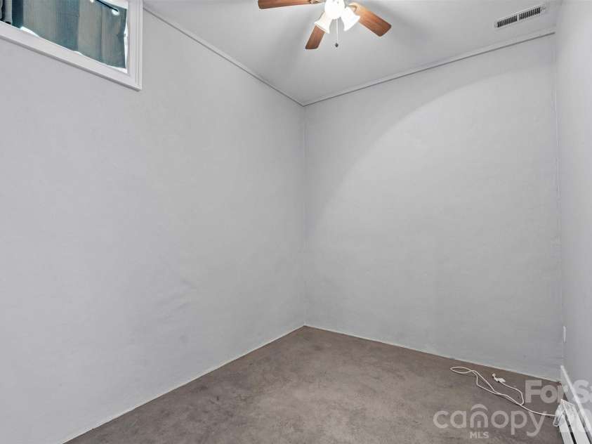 22 Pear Tree Lane, Leicester, NC 28748.  MLS# CAR4371027, YatesRealty ID 12806. Bonus room in the basement level