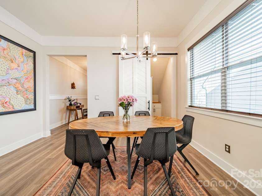 5006 Whitman Avenue, Matthews, NC 28105.  MLS# CAR4237851, YatesRealty ID 12807. Dining area with view of butler's pantry