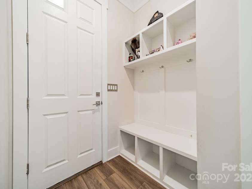 5006 Whitman Avenue, Matthews, NC 28105.  MLS# CAR4237851, YatesRealty ID 12807. Drop zone at garage entry