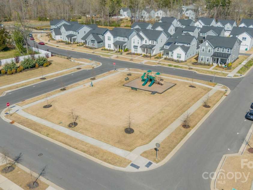 5006 Whitman Avenue, Matthews, NC 28105.  MLS# CAR4237851, YatesRealty ID 12807. Playground and greenspace