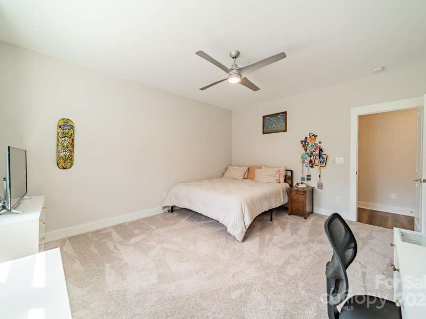 5006 Whitman Avenue, Matthews, NC 28105.  MLS# CAR4237851, YatesRealty ID 12807. Upper level bedroom 1