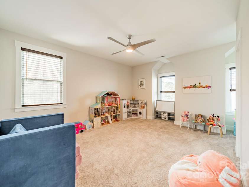 5006 Whitman Avenue, Matthews, NC 28105.  MLS# CAR4237851, YatesRealty ID 12807. Upper level bedroom 3