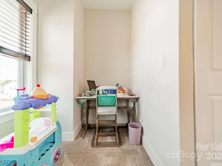 5006 Whitman Avenue, Matthews, NC 28105.  MLS# CAR4237851, YatesRealty ID 12807. Upper level bedroom 3