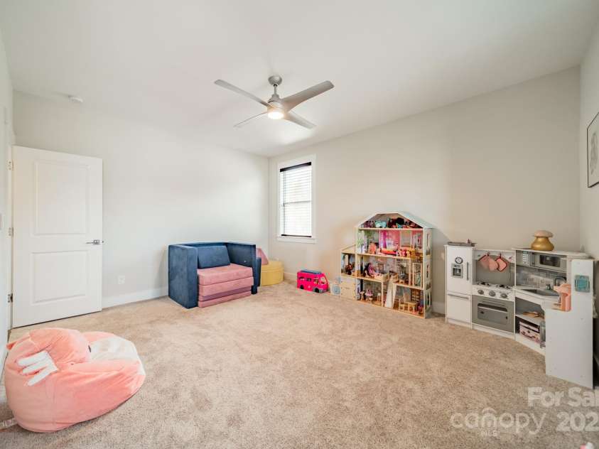 5006 Whitman Avenue, Matthews, NC 28105.  MLS# CAR4237851, YatesRealty ID 12807. Upper level bedroom 3