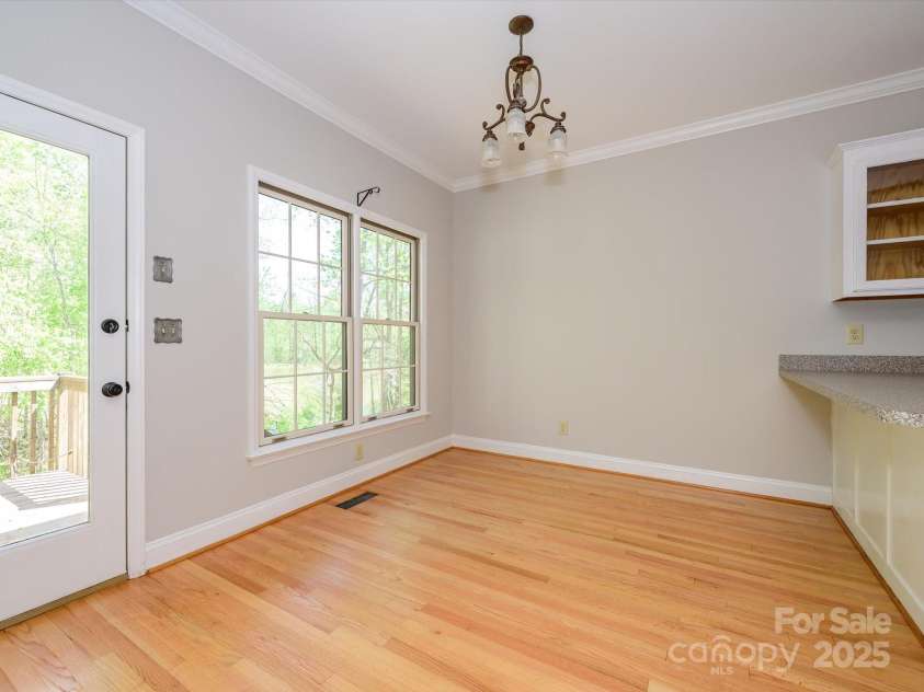 1448-1 New Prospect Church Road, Shelby, NC 28150.  MLS# CAR4214412, YatesRealty ID 12811. Breakfast Area has a door to one of the rear decks.