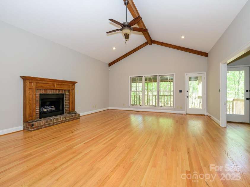 1448-1 New Prospect Church Road, Shelby, NC 28150.  MLS# CAR4214412, YatesRealty ID 12811. Living Room has a fireplace with gas logs.