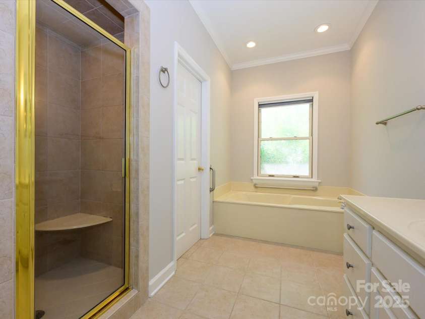 1448-1 New Prospect Church Road, Shelby, NC 28150.  MLS# CAR4214412, YatesRealty ID 12811. Primary Bath has a walk-in shower.