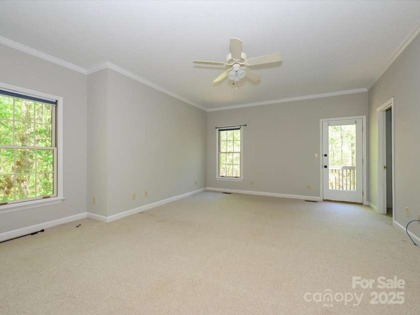 1448-1 New Prospect Church Road, Shelby, NC 28150.  MLS# CAR4214412, YatesRealty ID 12811. Primary Bedroom is spacious and has door to the other rear deck.