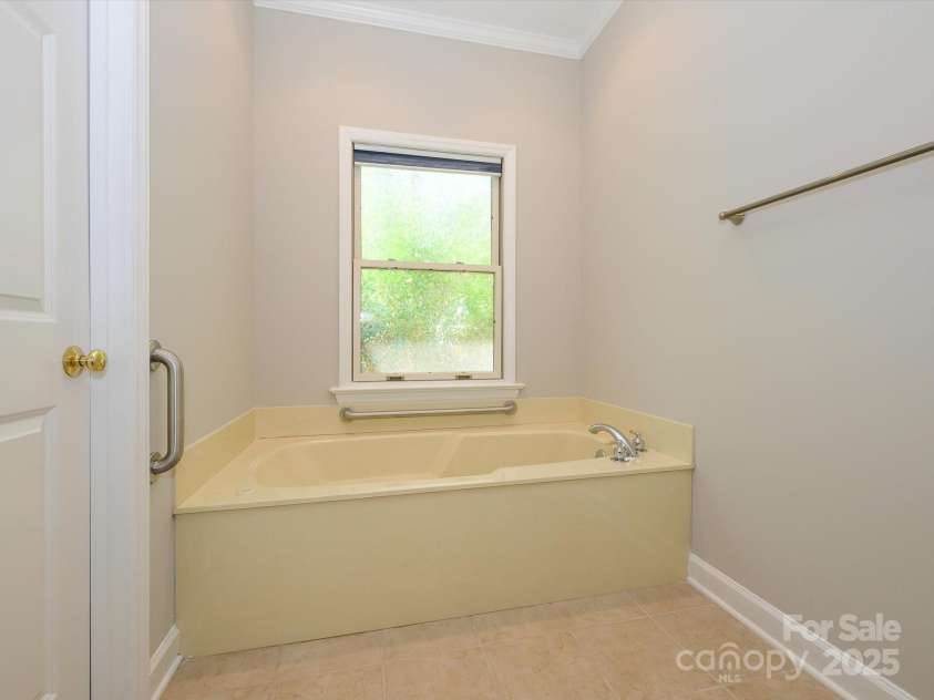 1448-1 New Prospect Church Road, Shelby, NC 28150.  MLS# CAR4309111, YatesRealty ID 12811. Primary Bath has  a soaking tub.