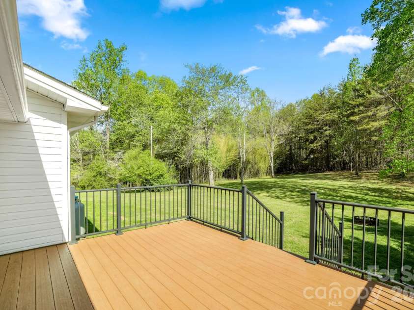 154 Cactus Lane, Franklin, NC 28734.  MLS# CAR4353446, YatesRealty ID 12812. Back yard Trex Deck