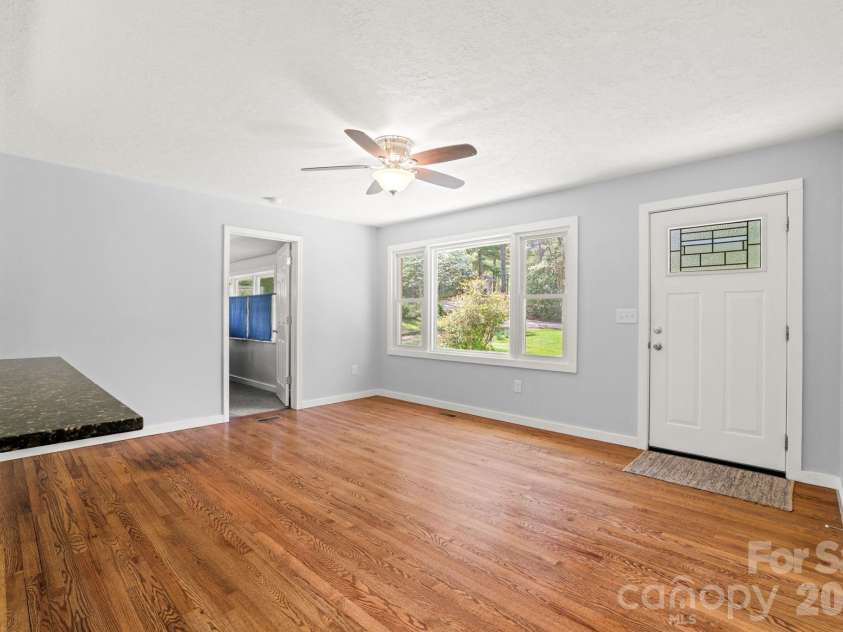 154 Cactus Lane, Franklin, NC 28734.  MLS# CAR4353446, YatesRealty ID 12812. Living Room and Entry Way