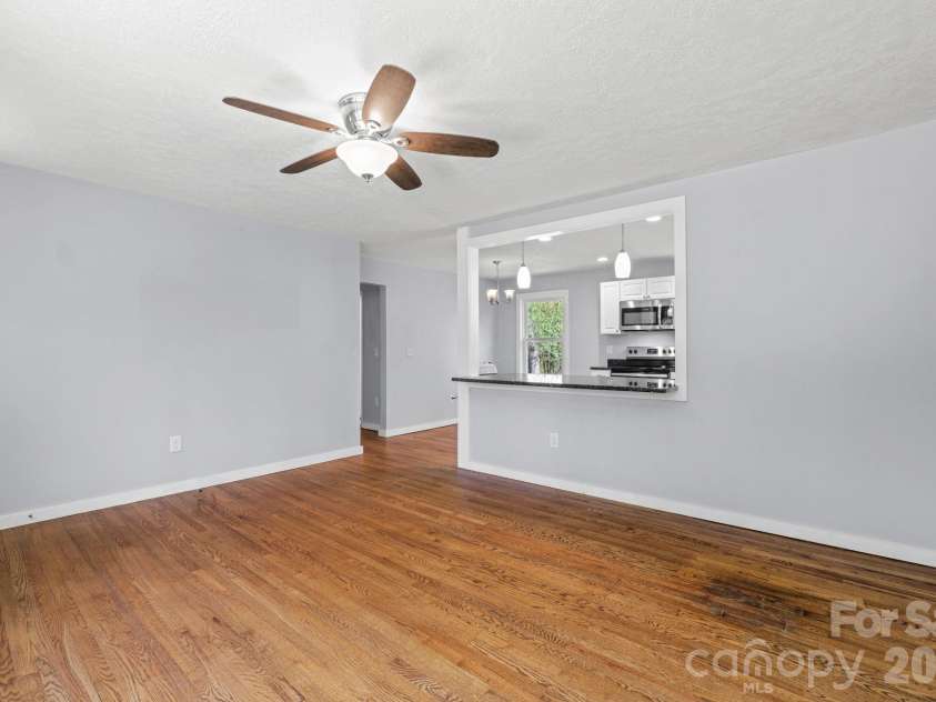 154 Cactus Lane, Franklin, NC 28734.  MLS# CAR4353446, YatesRealty ID 12812. Open Living Room to Kitchen