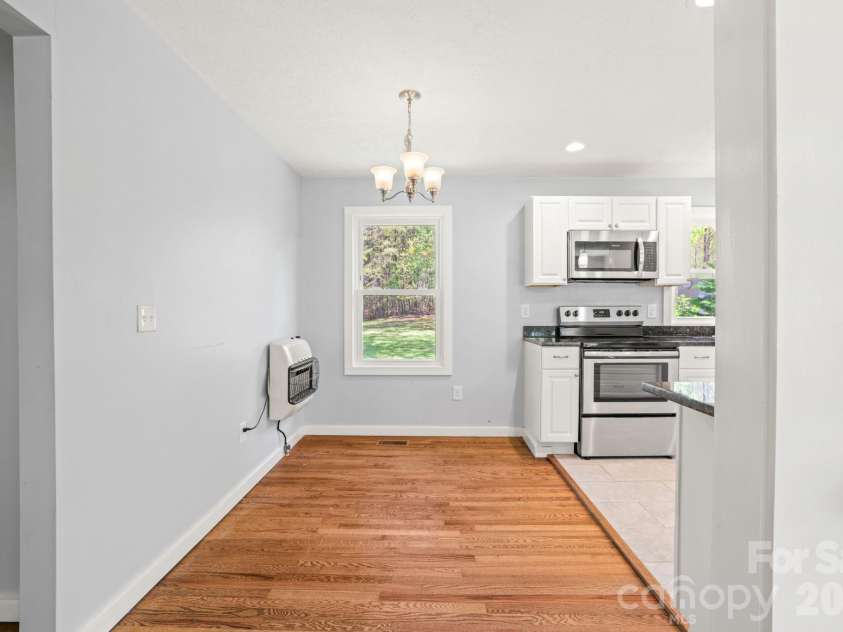 154 Cactus Lane, Franklin, NC 28734.  MLS# CAR4353446, YatesRealty ID 12812. Spacious Dining Area off Living Room and Kitchen