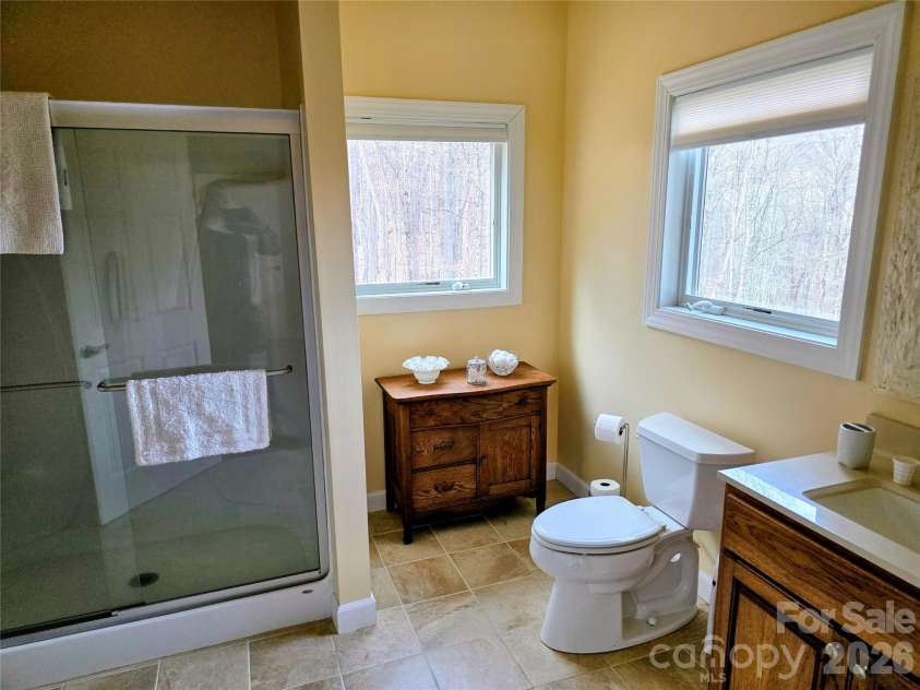 254 Ray Mine Road, Burnsville, NC 28714.  MLS# CAR4351718, YatesRealty ID 12813. Ensuite bathroom on lower level