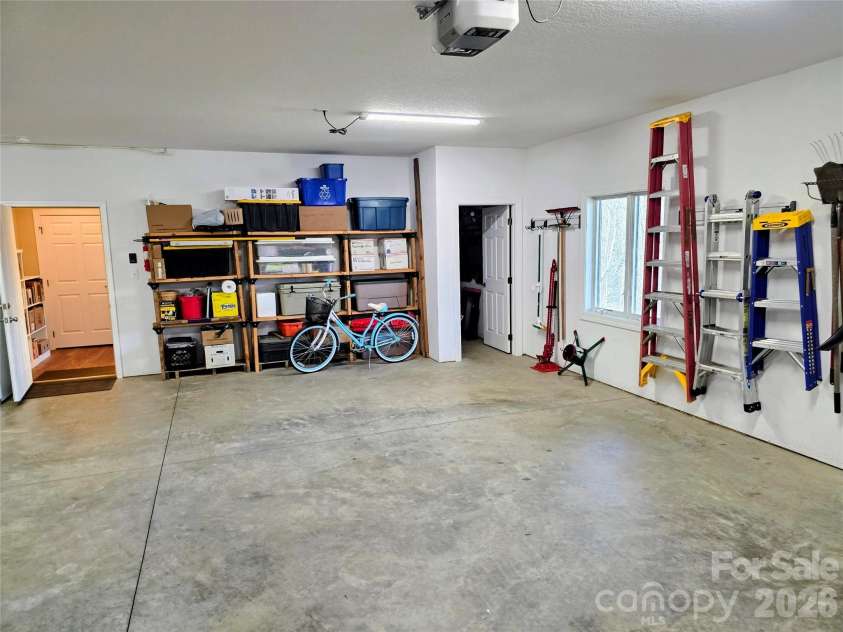 254 Ray Mine Road, Burnsville, NC 28714.  MLS# CAR4351718, YatesRealty ID 12813. Garage area