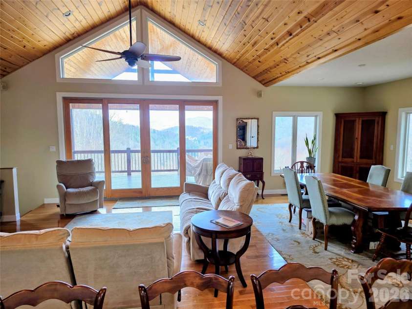254 Ray Mine Road, Burnsville, NC 28714.  MLS# CAR4351718, YatesRealty ID 12813. Great room with dining area