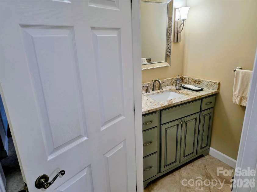 254 Ray Mine Road, Burnsville, NC 28714.  MLS# CAR4351718, YatesRealty ID 12813. Half Bath on main level