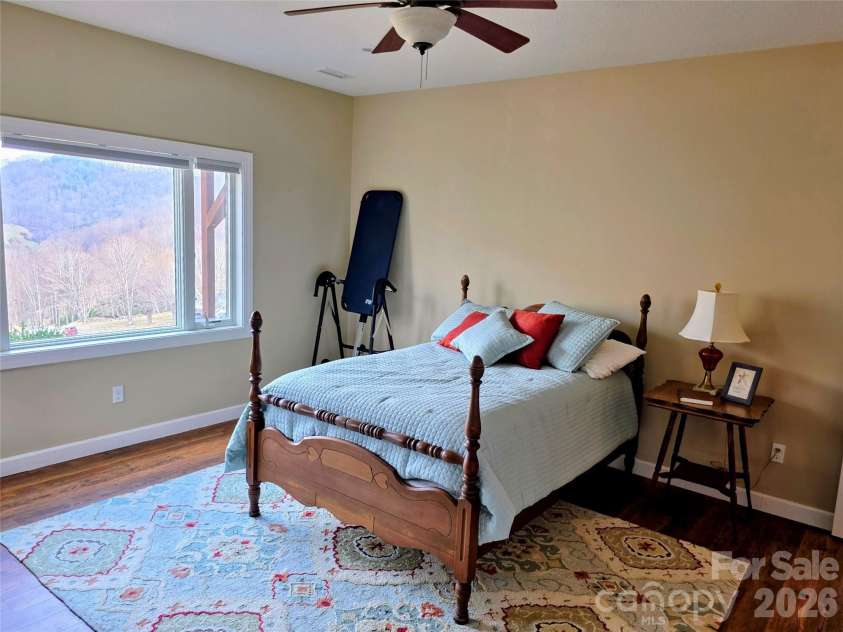 254 Ray Mine Road, Burnsville, NC 28714.  MLS# CAR4351718, YatesRealty ID 12813. Lower level bedroom