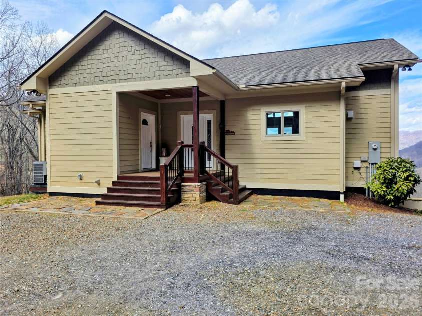 254 Ray Mine Road, Burnsville, NC 28714.  MLS# CAR4351718, YatesRealty ID 12813. Main entry from rear porch