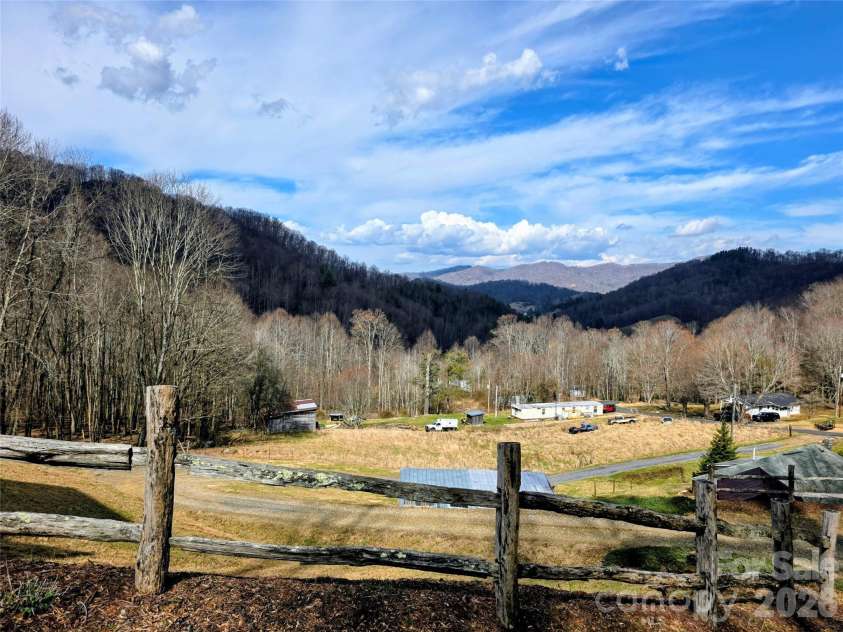254 Ray Mine Road, Burnsville, NC 28714.  MLS# CAR4351718, YatesRealty ID 12813. Mountain views from circular driveway