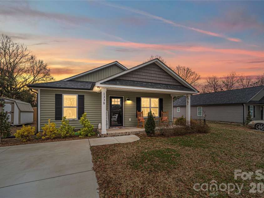 1338 Eastside Avenue, Albemarle, NC 28001.  MLS# CAR4342335, YatesRealty ID 1282. A newer build with timeless design, featuring a fenced backyard and move-in-ready condition.