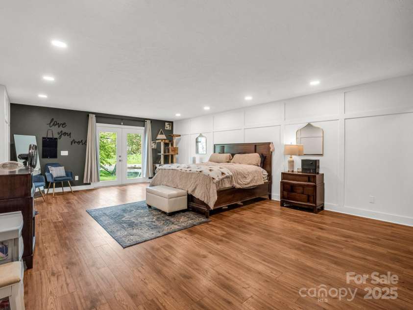 88 Valley Street, Marion, NC 28752.  MLS# CAR4247469, YatesRealty ID 12820. Family/Rec Room currently used as Primary Suite