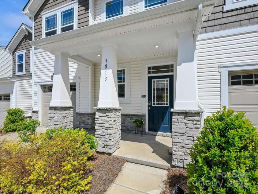 3813 Amalia Place, Indian Land, SC 29707.  MLS# CAR4246224, YatesRealty ID 12822. Covered Front Porch accented in Stone.