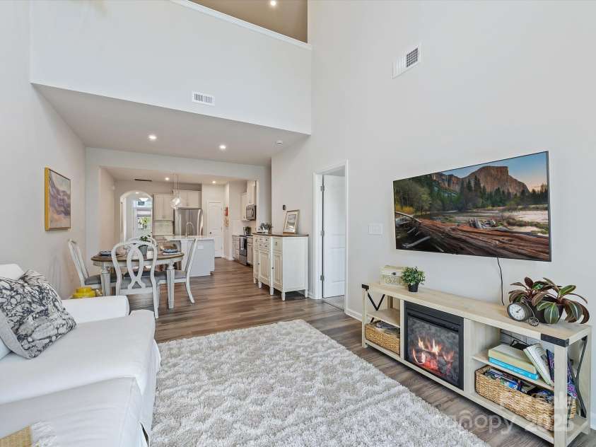 3813 Amalia Place, Indian Land, SC 29707.  MLS# CAR4246224, YatesRealty ID 12822. Entry to the Main Level Primary Suite is located off of the Living Room area.