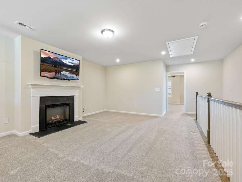 3813 Amalia Place, Indian Land, SC 29707.  MLS# CAR4246224, YatesRealty ID 12822. Second Story Open Loft with view of the Second Primary Bedroom Suite