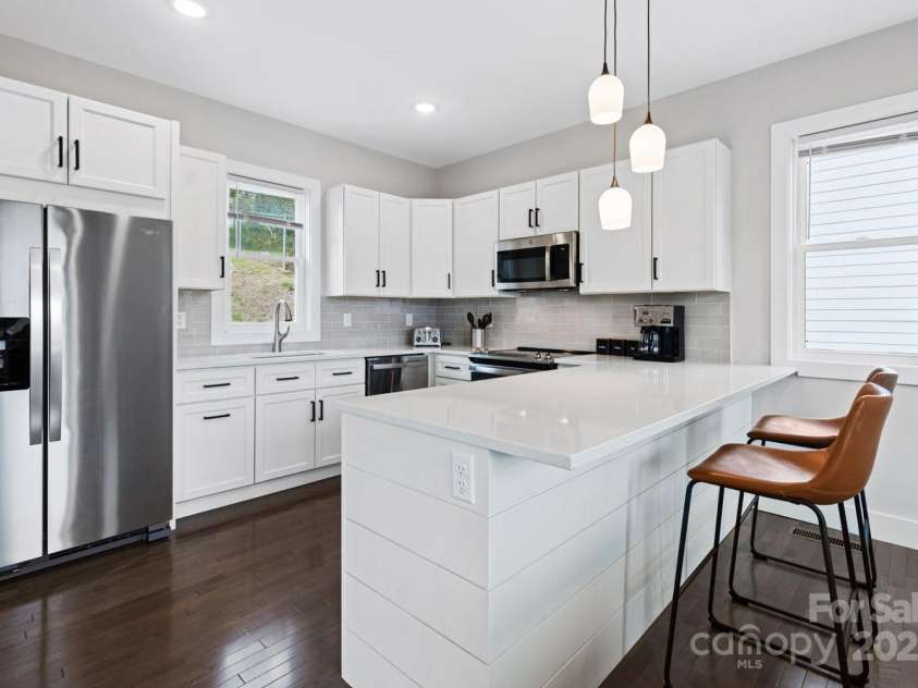 1061 Riverside Drive, Asheville, NC 28804.  MLS# CAR4250839, YatesRealty ID 12823. 