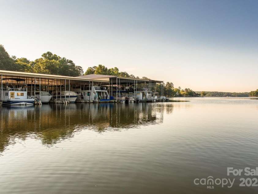 11 Tanglewood Road, Lake Wylie, SC 29710.  MLS# CAR4237959, YatesRealty ID 12829. River Hills marina is a convenient place to store your boat, watch the sunset, fish, and participate in  community events like music at the marina THIS summer!