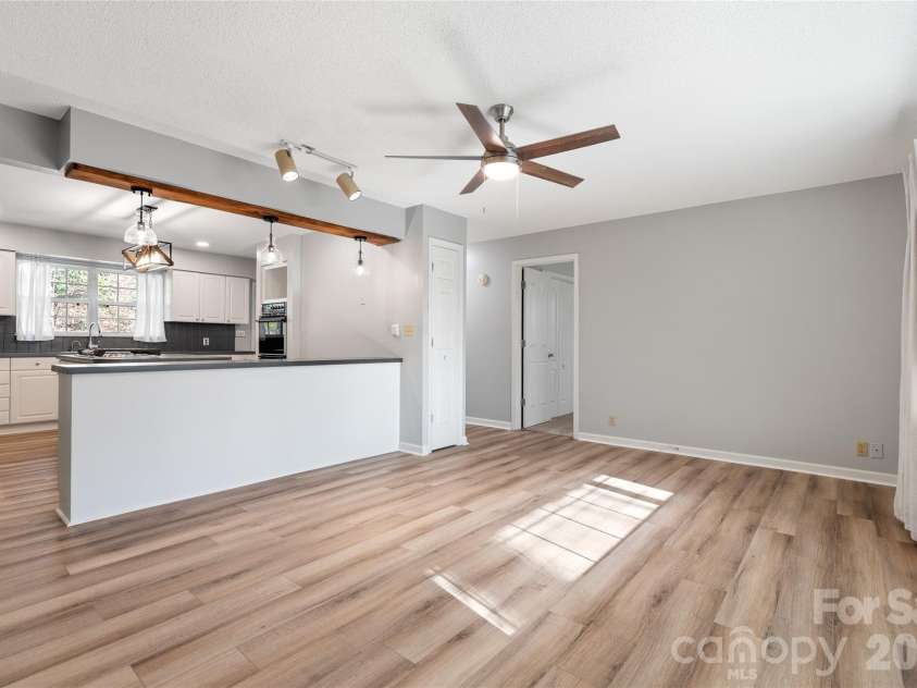177 Country Road, Brevard, NC 28712.  MLS# CAR4331817, YatesRealty ID 12832. Dining area into Kitchen