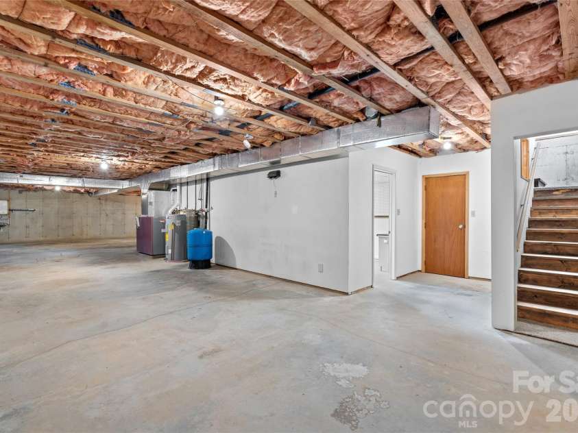 177 Country Road, Brevard, NC 28712.  MLS# CAR4331817, YatesRealty ID 12832. Huge basement