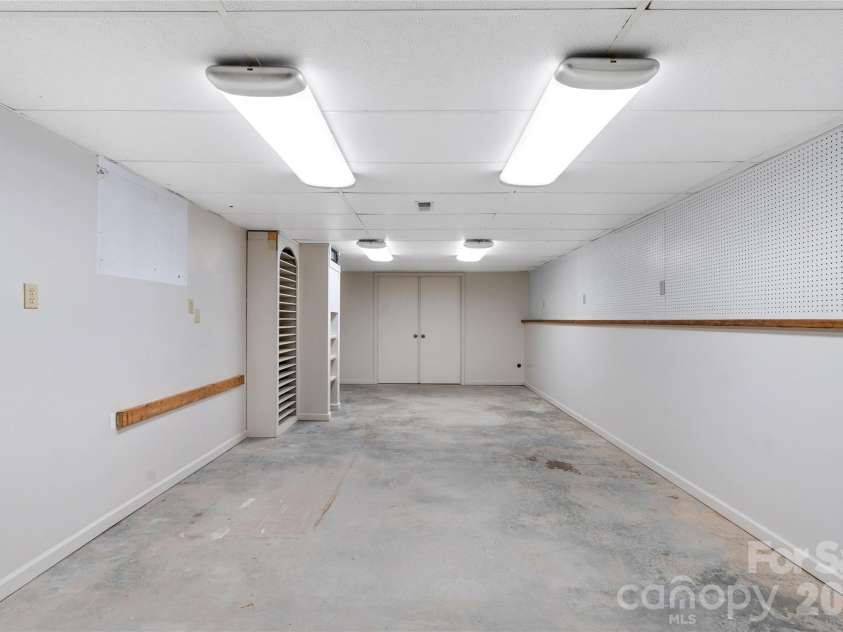 177 Country Road, Brevard, NC 28712.  MLS# CAR4331817, YatesRealty ID 12832. Large, conditioned workshop/gameroom